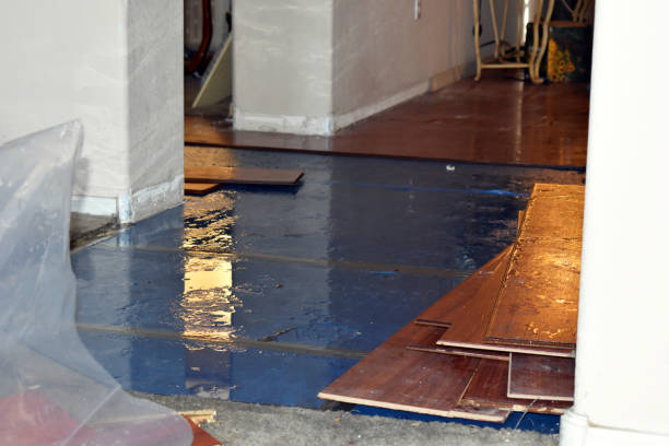 Professional Water Damage Restoration technician working in Islip, NY